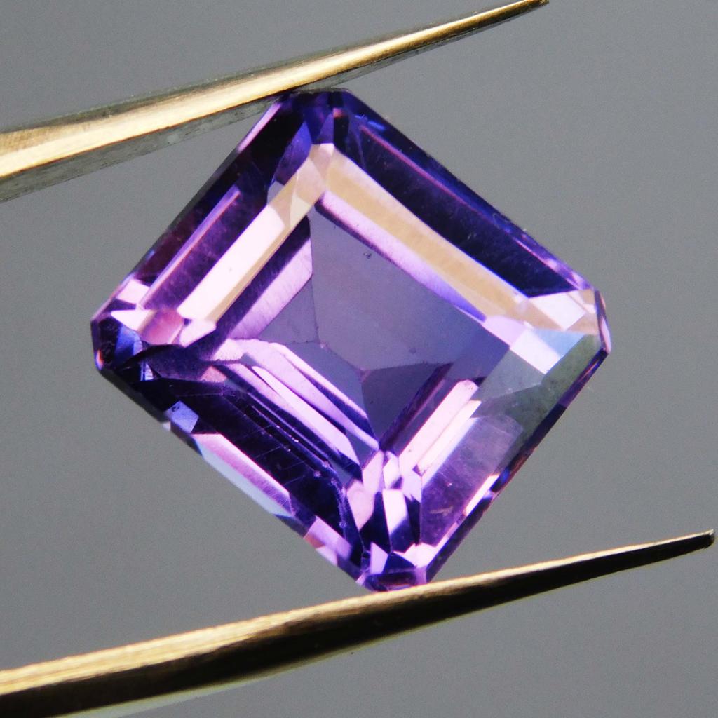 Natural Purple Tanzanite Loose Gemstone 10.80 Ct Emerald Cut for Jewelry Making and Gem Collections