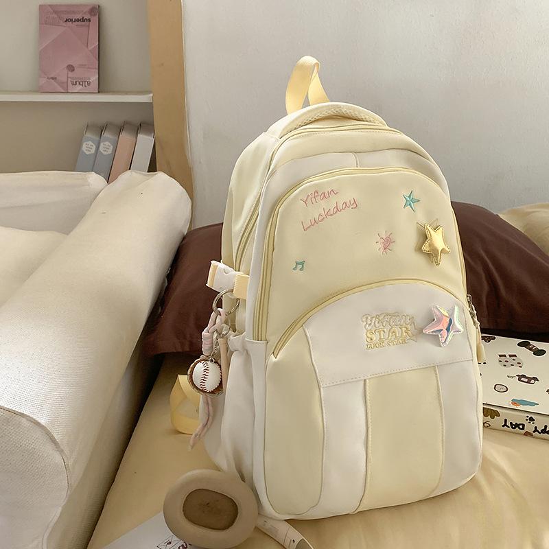 Campus schoolbag female niche design baseball cap backpack junior high school students large capacity commuting light leisure backpack