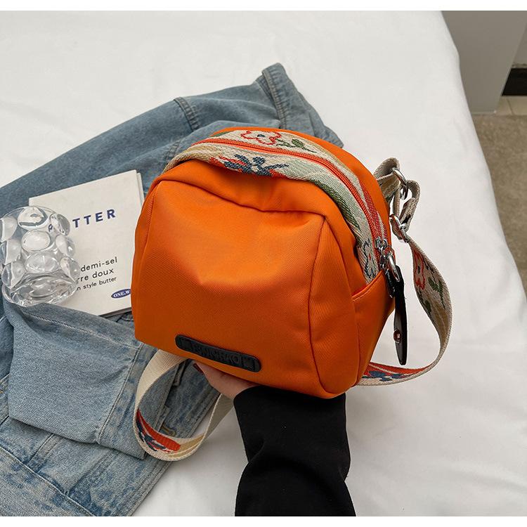 

2025 new shoulder fashion bag women s bag messenger bag women s bag canvas bag versatile women s Oxford cloth shell помаранчевий