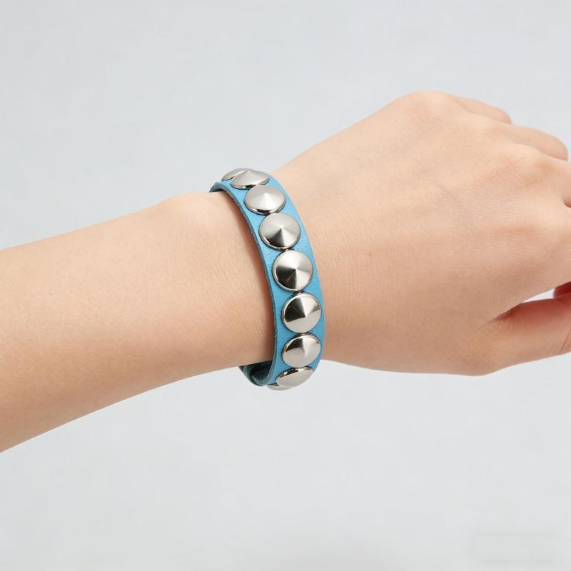 Modern Unisex Spiked Wrist Bangle Bracelet Featuring PU Leather And Stylish Metallic Detail For Everyday Wear