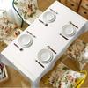 The elegant white tablecloth with gold leaf pattern is perfectly suitable for restaurant decoration.zyc