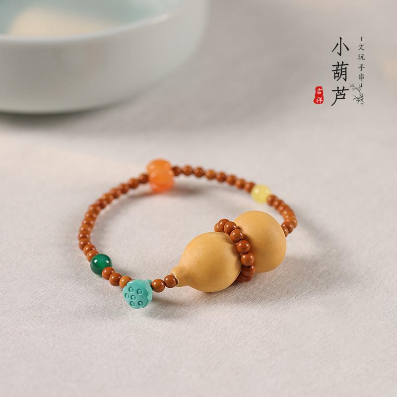 Kürbis Glücksarmband mit Olivenkern-Perlen, Neues chinesisches Stil Weiches Fingerwickelarmband, Traditionelles chinesisches Kunsthandwerk, Trendiges Design