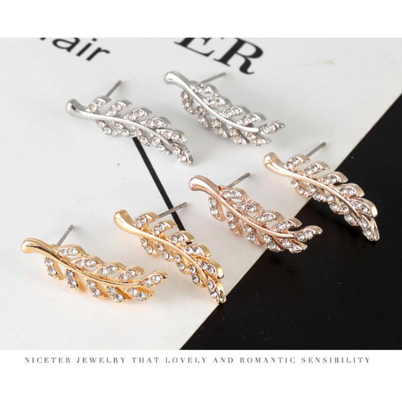 Fashionable Symmetrical Hollow Leaf Earrings New Alloy Long Earrings