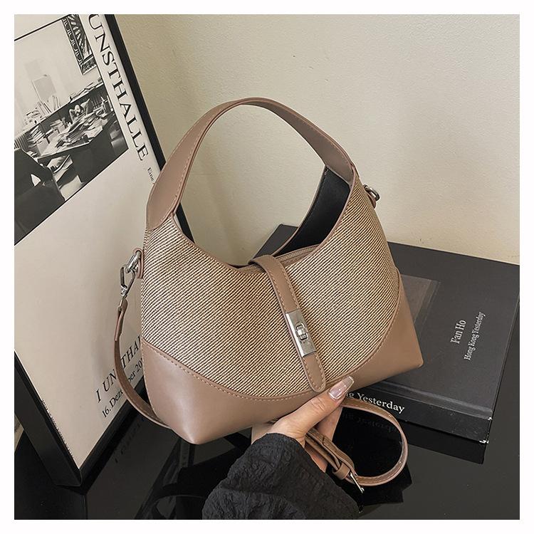 High-end contrasting color niche design bag women's new versatile commuter portable shoulder messenger women's bag