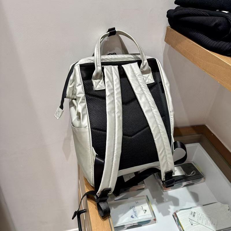 Značka módního návrháře Dámský a pánský batoh Trendy styl Taška na notebook 15,6 palce PU kůže Businessový ruksak Dámská školní taška