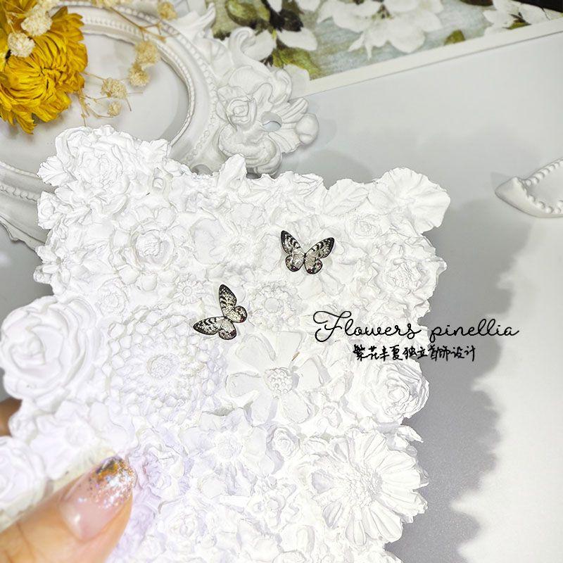 

Small Butterfly 12mm Earrings Collection S925 Sterling Silver Anti-Allergy Mori Style Fancy Exquisite Cute and Compact Earrings for Women A pair of ink butterfly earrings