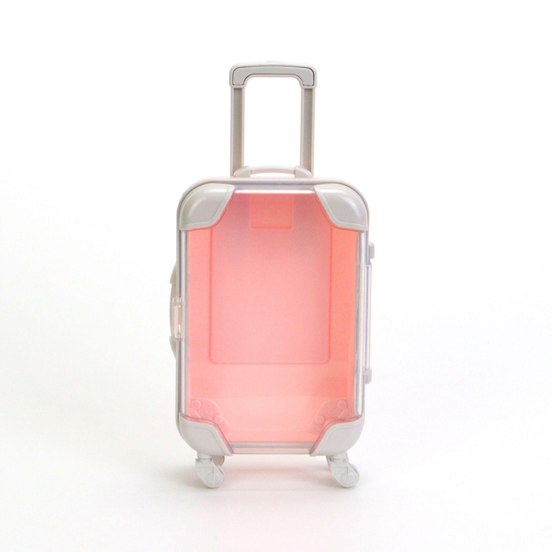 

Компактный прозрачный чемодан на колесиках для хранения косметики и ресниц