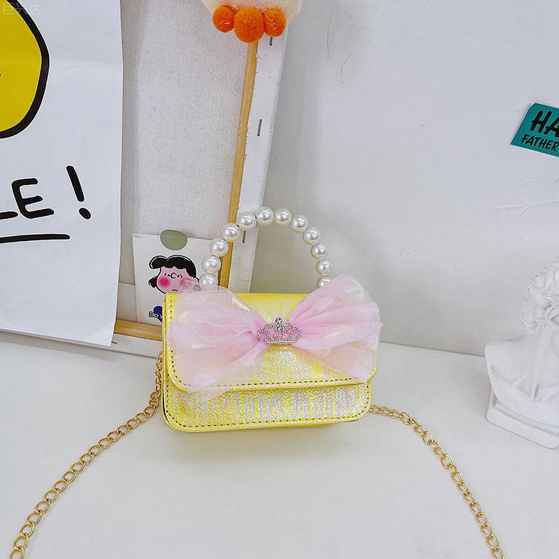 Trendy Breathable And Waterproof Mini Handheld Kids Shoulder Bag With Bow Design