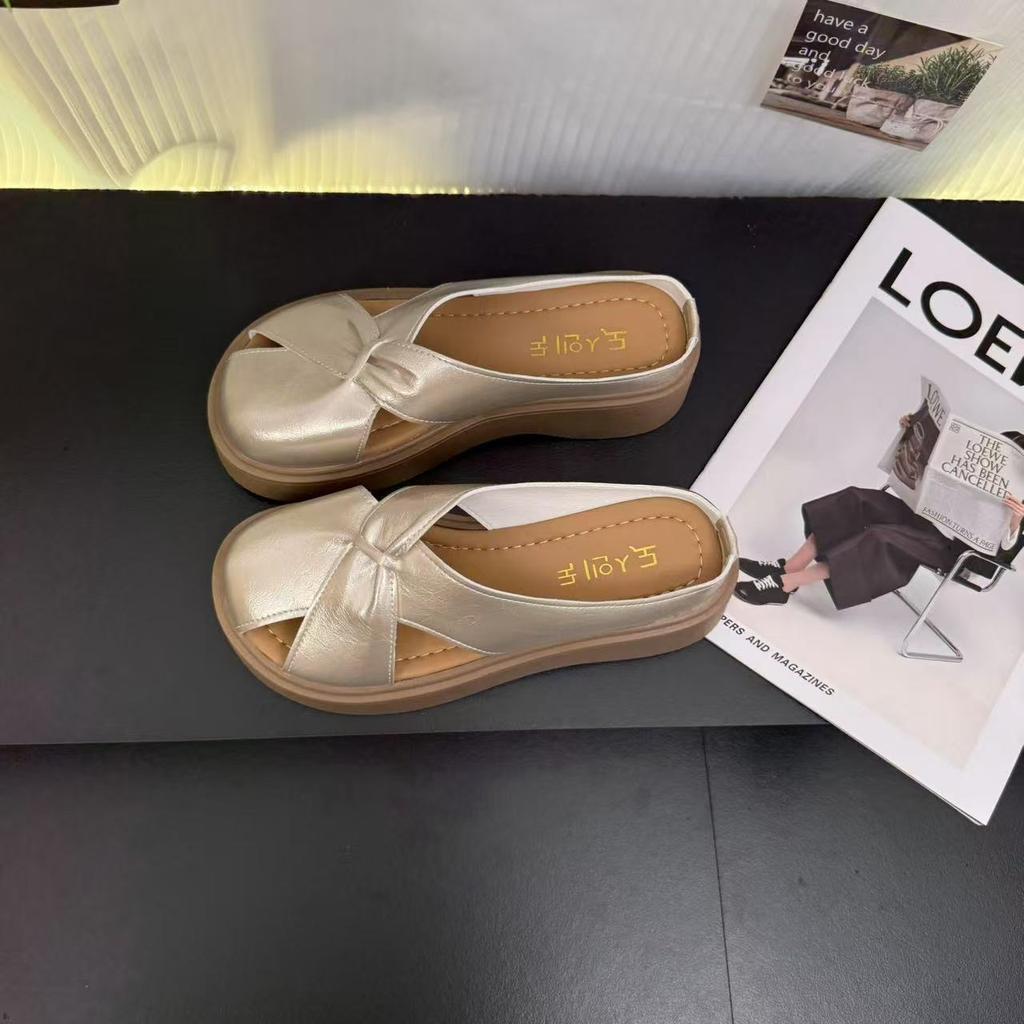 Baotou hollow slope heel half drag sandals women wear summer new French temperament flat bottom one word cool single shoes