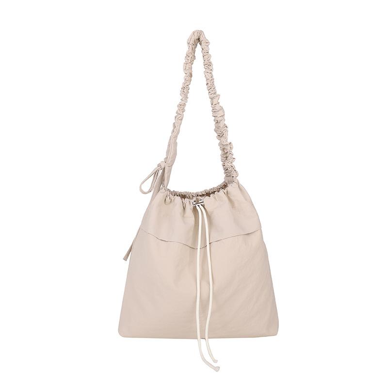 New Large-capacity Drawstring Bucket Bag Women's Leisure Commuter Shoulder Messenger Bag