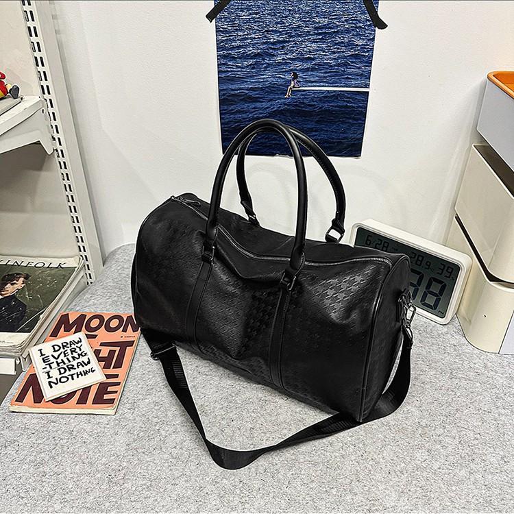 Spring and summer new niche shoulder travel bag large capacity men's and women's tote bag portable pu bag