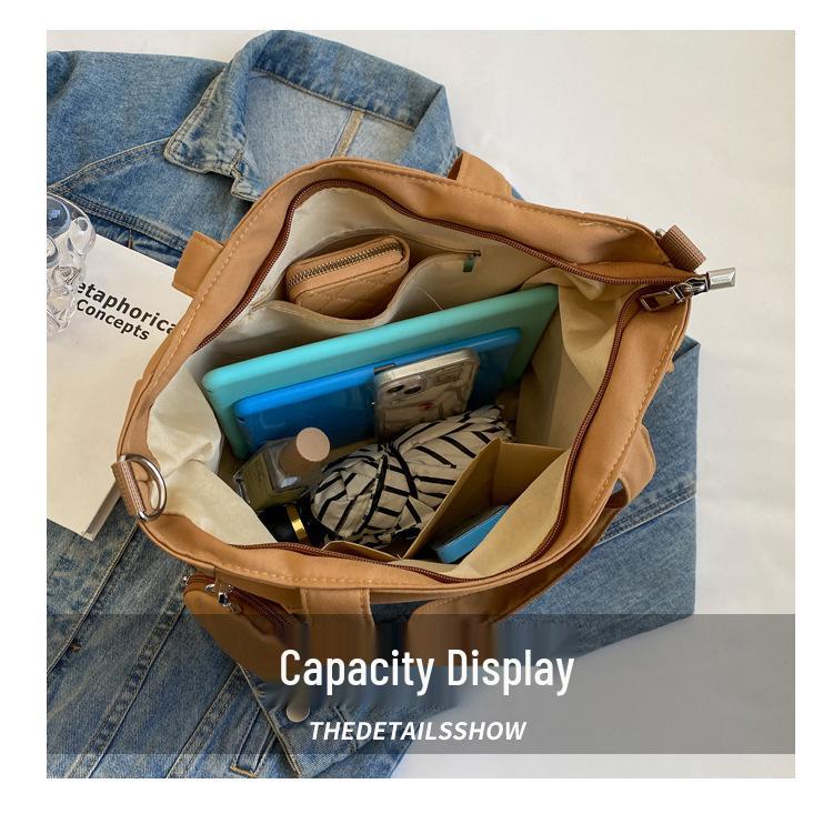 Japanese-Style Canvas Crossbody Bag: Double Pocket, Large Capacity, Women's Tote, Solid Color, Perfect for Students and Commuting.