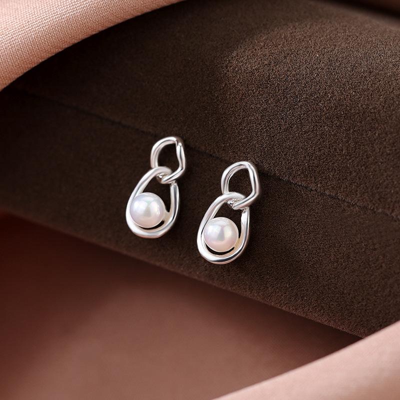 

Серьги-гвоздики с цепочкой и жемчугом, женские, легкие, роскошные, нишевые, дизайн, нерегулярные, нежные, геометрические серьги