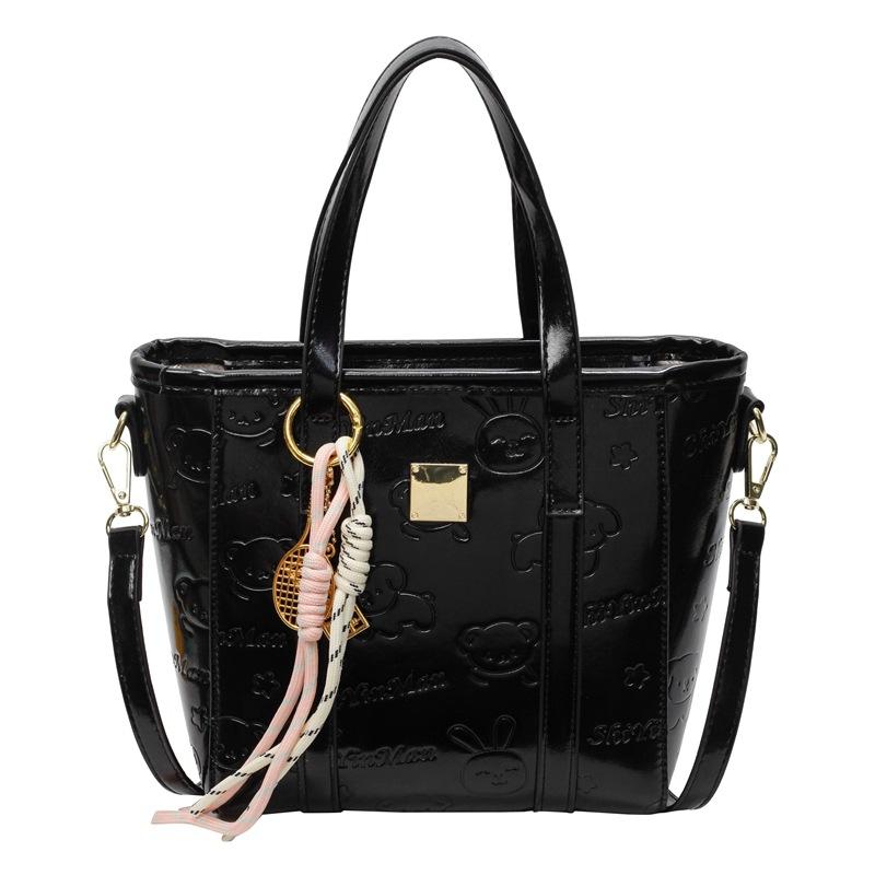 Korean version of high-end fashion and cute embossed portable bucket bag, women's commuting versatile foreign style messenger bag