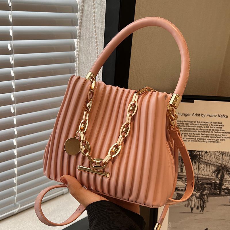 

Сумка маленького размера премиум-текстуры, женская летняя новая нишевая дизайнерская сумка-мессенджер, цепочка, портативная плиссированная сумка-ведро no specification розовый