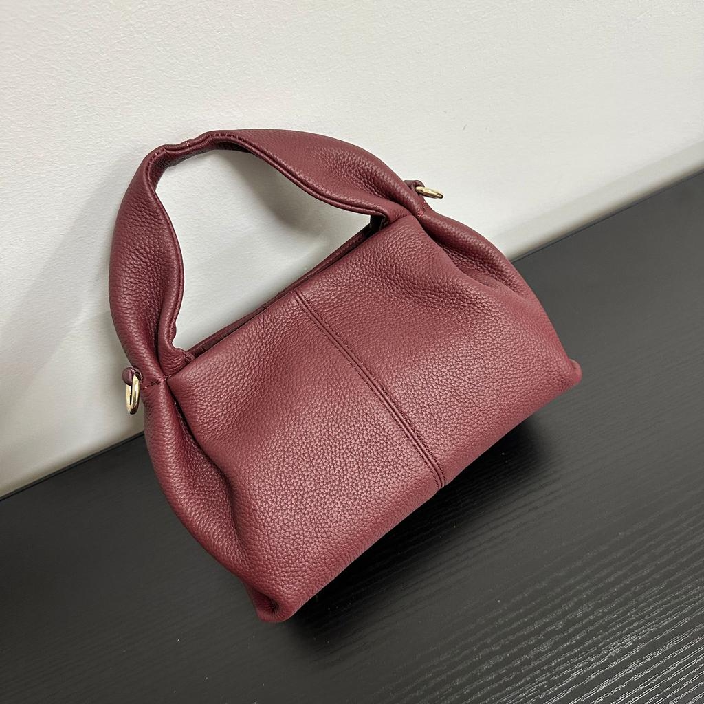 Haute couture first layer cowhide pleated cloud bag niche high-end handbag oblique span shoulder bag women's 2025 new