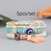 JYL Bracelet  Bohemian Evil Eye Rice Bead Tassel Blocks Negativity