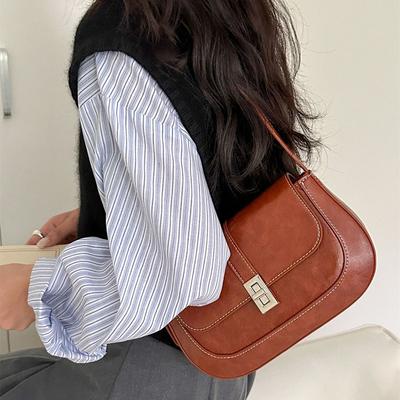 Nische High-Texture Unterarmtasche Retro Tragbar Magnetverschluss Baguette-Tasche Temperament Damen Schulter Crossbody Satteltasche Damen