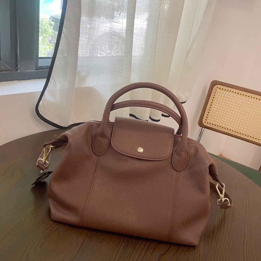 Japanese and Korean Soft Cowhide Handbag: Classic Women's Genuine Leather Dumpling Bag, Shoulder & Crossbody Style.