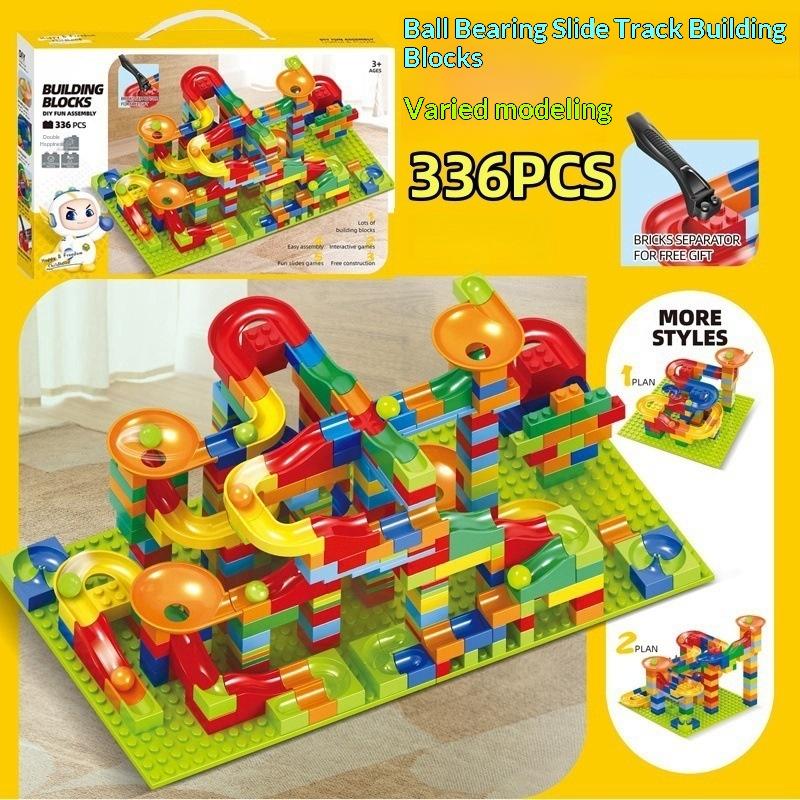 Fun Children'S Ball Slide Track Building Blocks Assembled With Ball-Sized Granular Toys To Assemble Holiday Gifts.