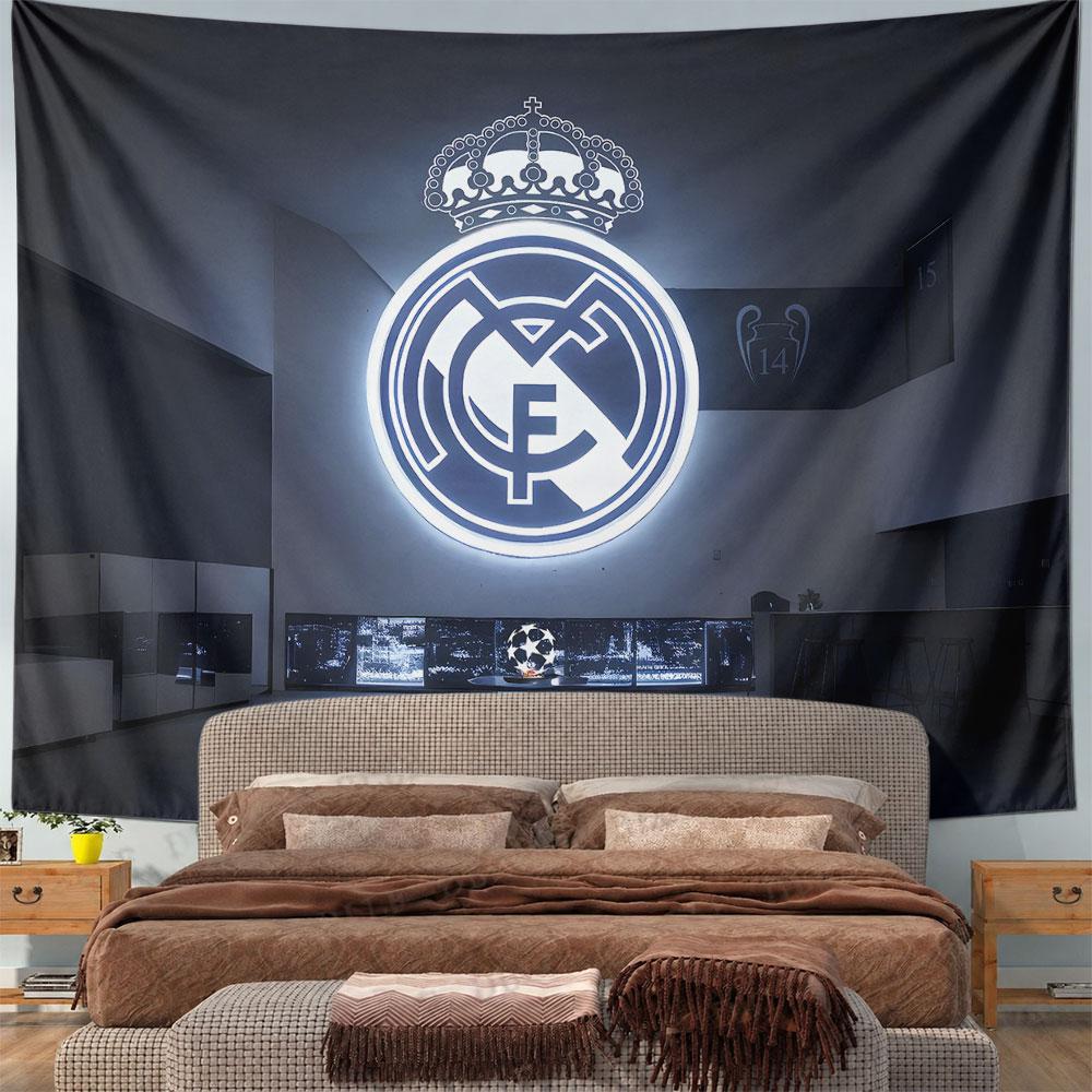 Illuminated Real Madrid crest with crown, displayed above a trophy setup. Patterned tapestry for bedroom and living room home decor