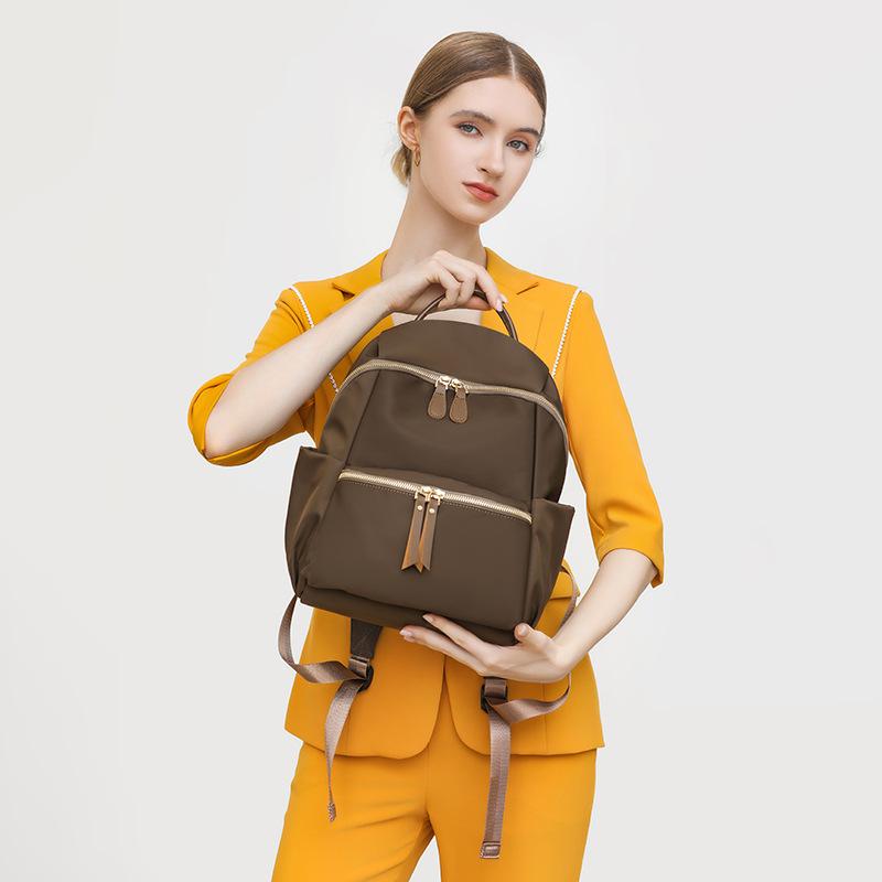 

Новый женский рюкзак, нишевый, с чувством высокого класса, большой вместимости, дорожный рюкзак, женская сумка для путешествий на короткие расстояния, легкий коричневый