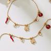 Pulseira com Pingente de Trevo em Aço Inoxidável Banhado a Ouro 18K com Zircônia, Corrente Cobra e Contas