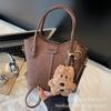 Hand bag women's 2025 new trendy high-end sense exquisite super fire commuter shoulder bag crossbody portable bucket bag