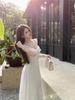 Women's Elegant White Spaghetti Strap Backless Summer Dress 2026 - Long, Beautiful Beach Photo Shoot Fairy Style