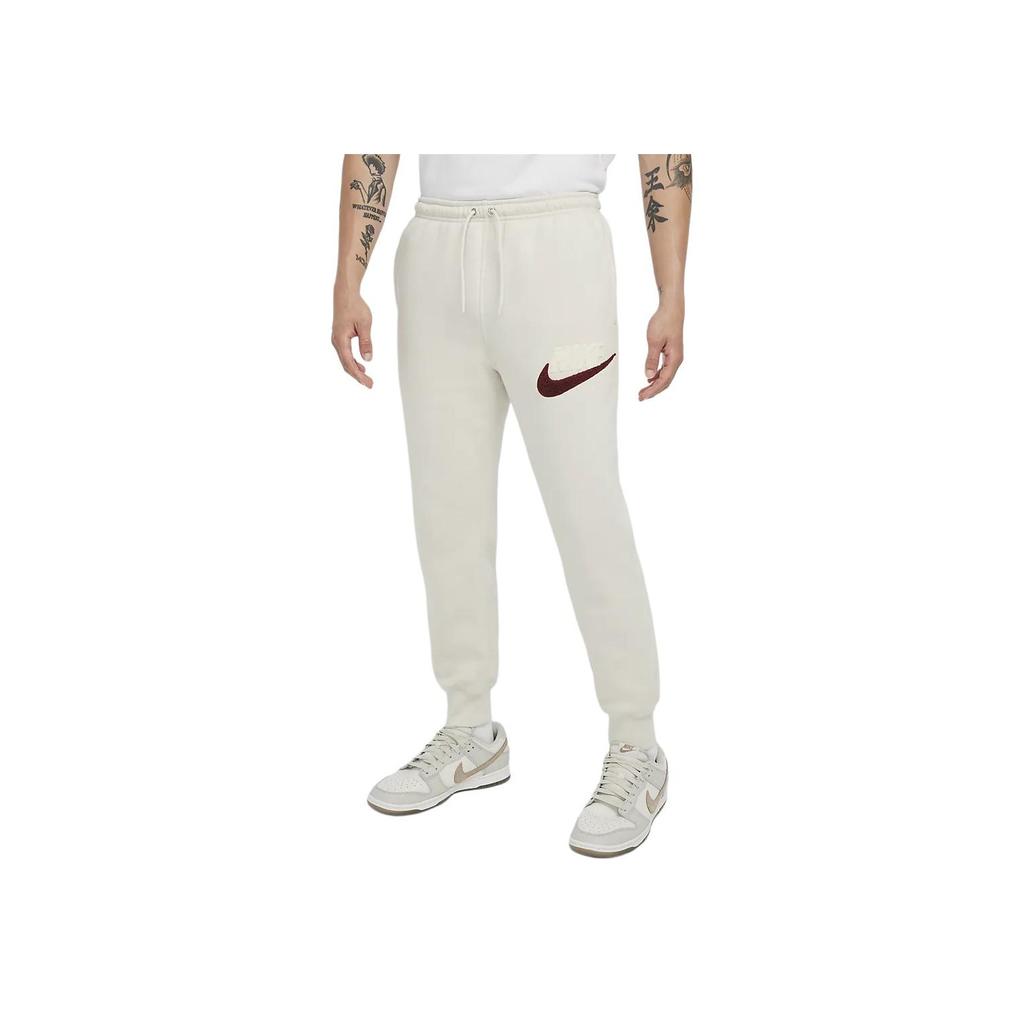 Nike Pantaloni Lunghi Comodi con Coulisse Club Fleece da Uomo Fondo Colore Marrone Chiaro FN3095-104