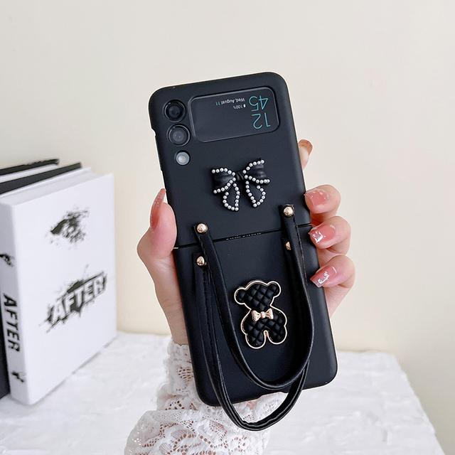 

Для Samsung Galaxy Z Flip 4 3 5g чехол модный корейский 3d медвежий бант с узлом ремешок на руку портативный ремешок жесткий корпус из ПК для сумки Z Flip3 For SAM Z Flip4 чёрный