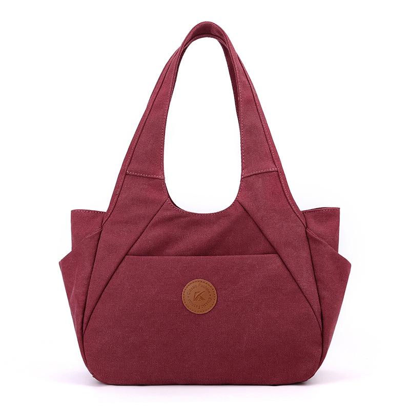 2025 Women's One-Shoulder Bag: Trendy, Versatile Canvas Handbag with Large Capacity, Simple Korean Style, Solid Color.