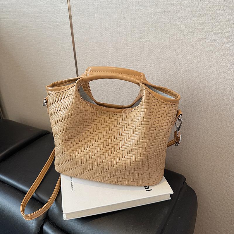 Simple and high-end portable mother and child bag women's summer new large-capacity messenger bucket bag