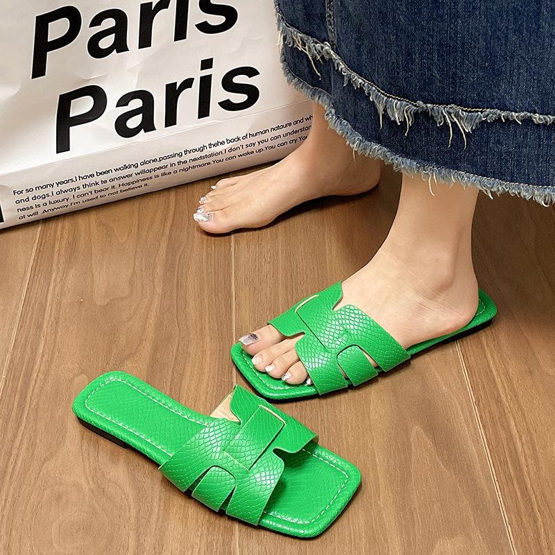 Foreign trade large size 2025 summer new slippers women's solid color simple daily beach slippers new woven belt