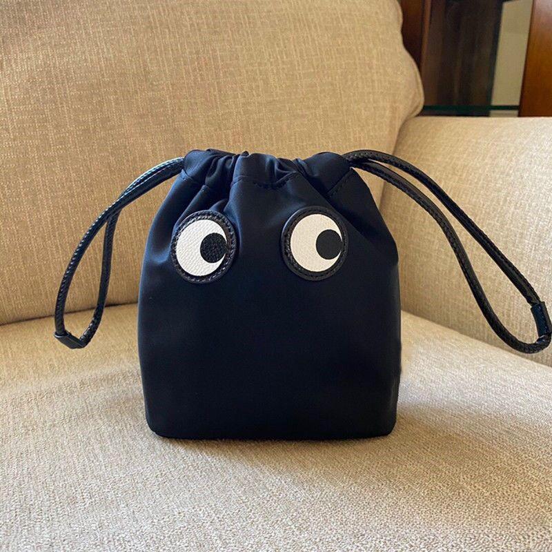 Cartoon Big Eyes Nylon Drawstring Handbag: Lightweight & Fashionable Mini Storage Bag