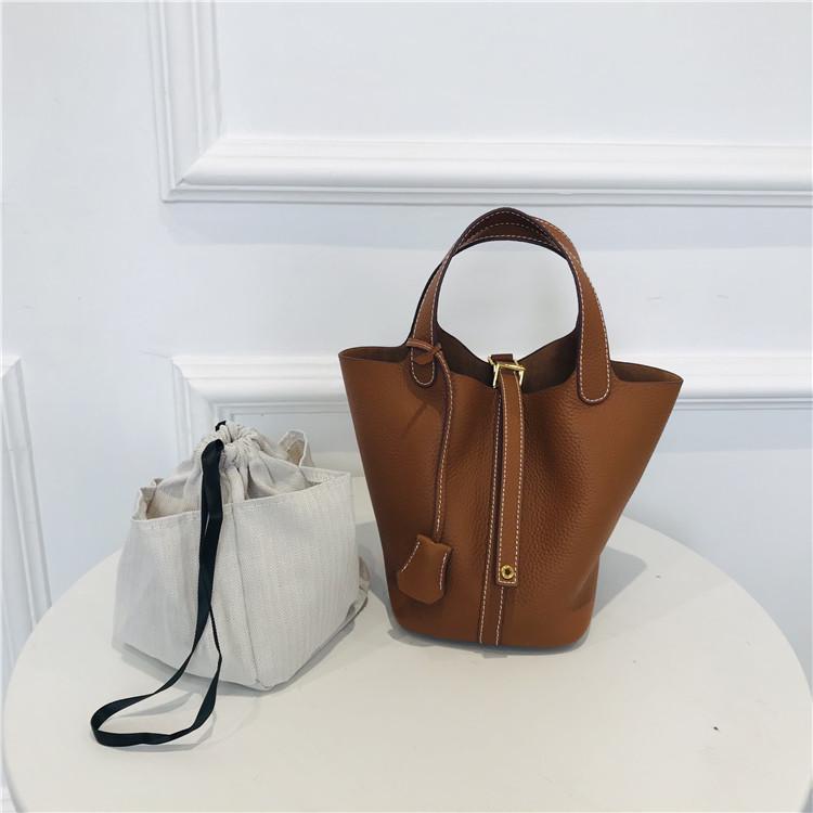 2024 Cowhide Lychee Pattern Vegetable Basket with Gold Hardware and Button - Mother-and-Child Bucket Handbag