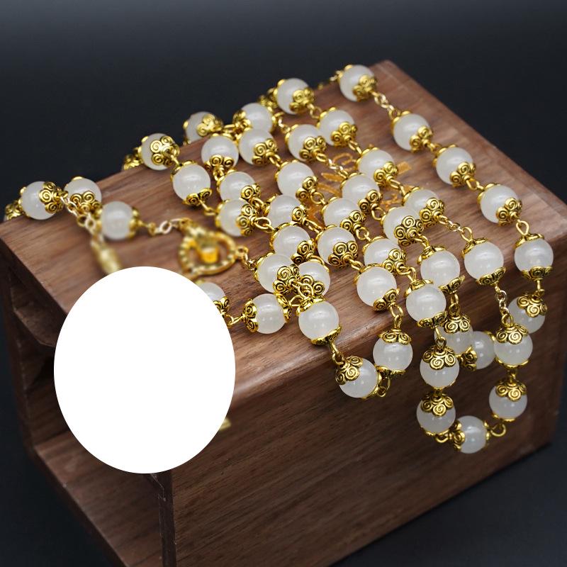 

Винтажный браслет-розарий из натурального белого халцедона с розой и римским крестом