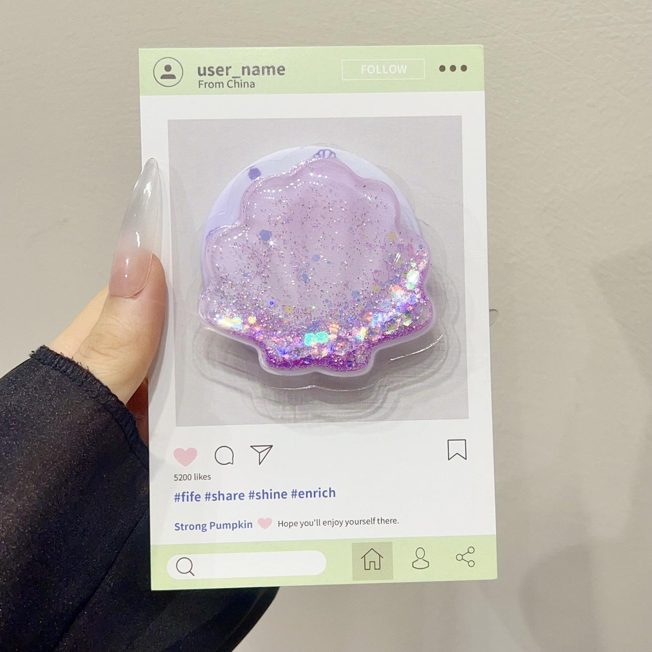 

Purple Liquid Sand Shell for MagSafe: Foldable, Retractable, Strong Airbag Phone Holder, Trendy Design for Women