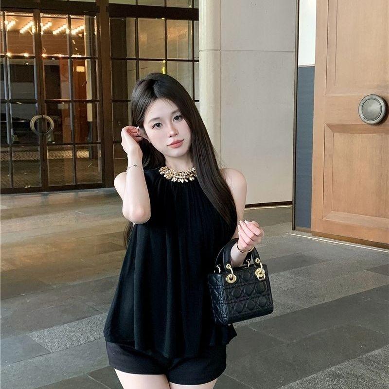 Schwarzes Chiffon Ärmelloses Lockeres Sommeroberteil für Damen mit Diamantenkette Stilvoll und Sexy