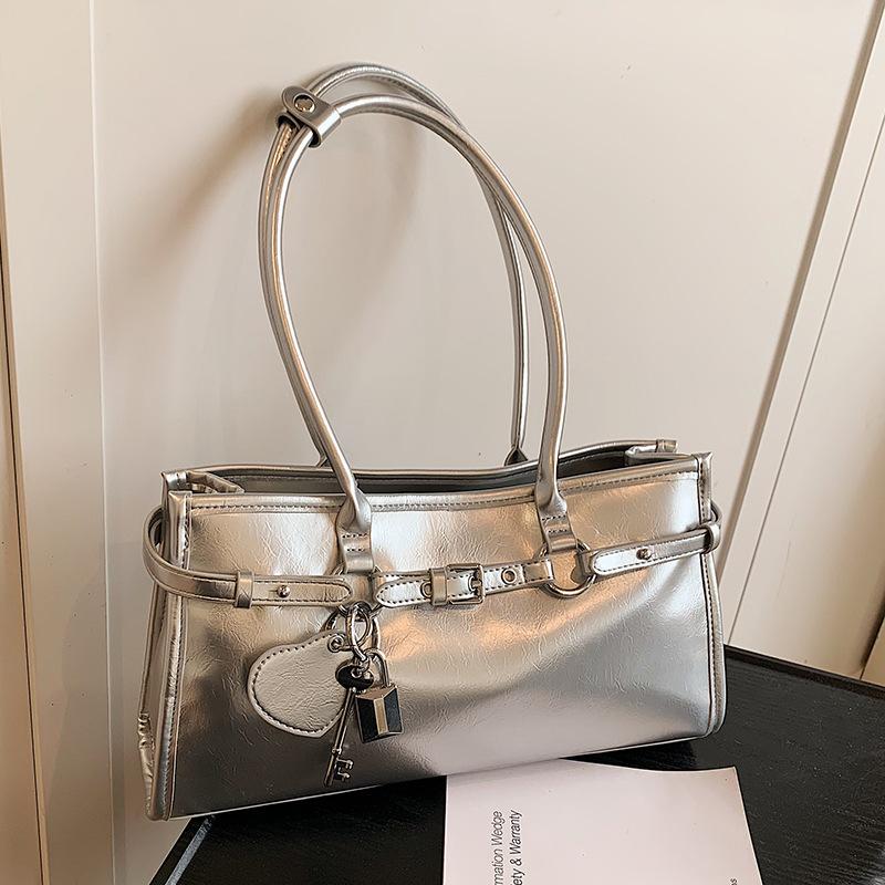 Frühling Neuprodukt Nischendesign personalisierte Ölwachsleder Achsel-Baguettetasche vielseitig Pendeln Temperament tragbare Umhängetasche Damen