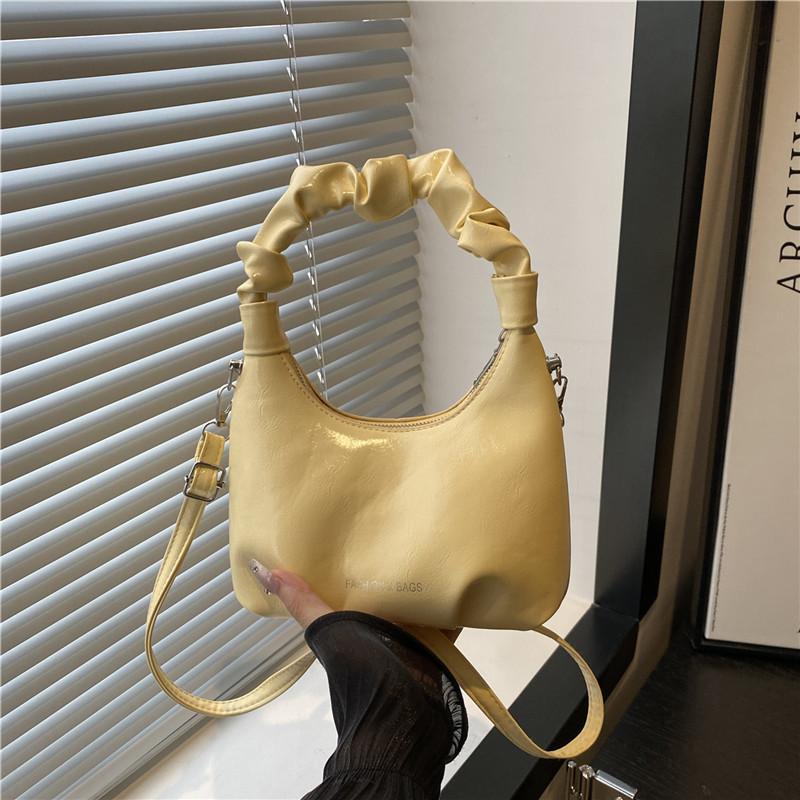

Summer new solid color fashion trend armpit bag temperament niche aesthetic pleated portable shoulder messenger bag жовтий