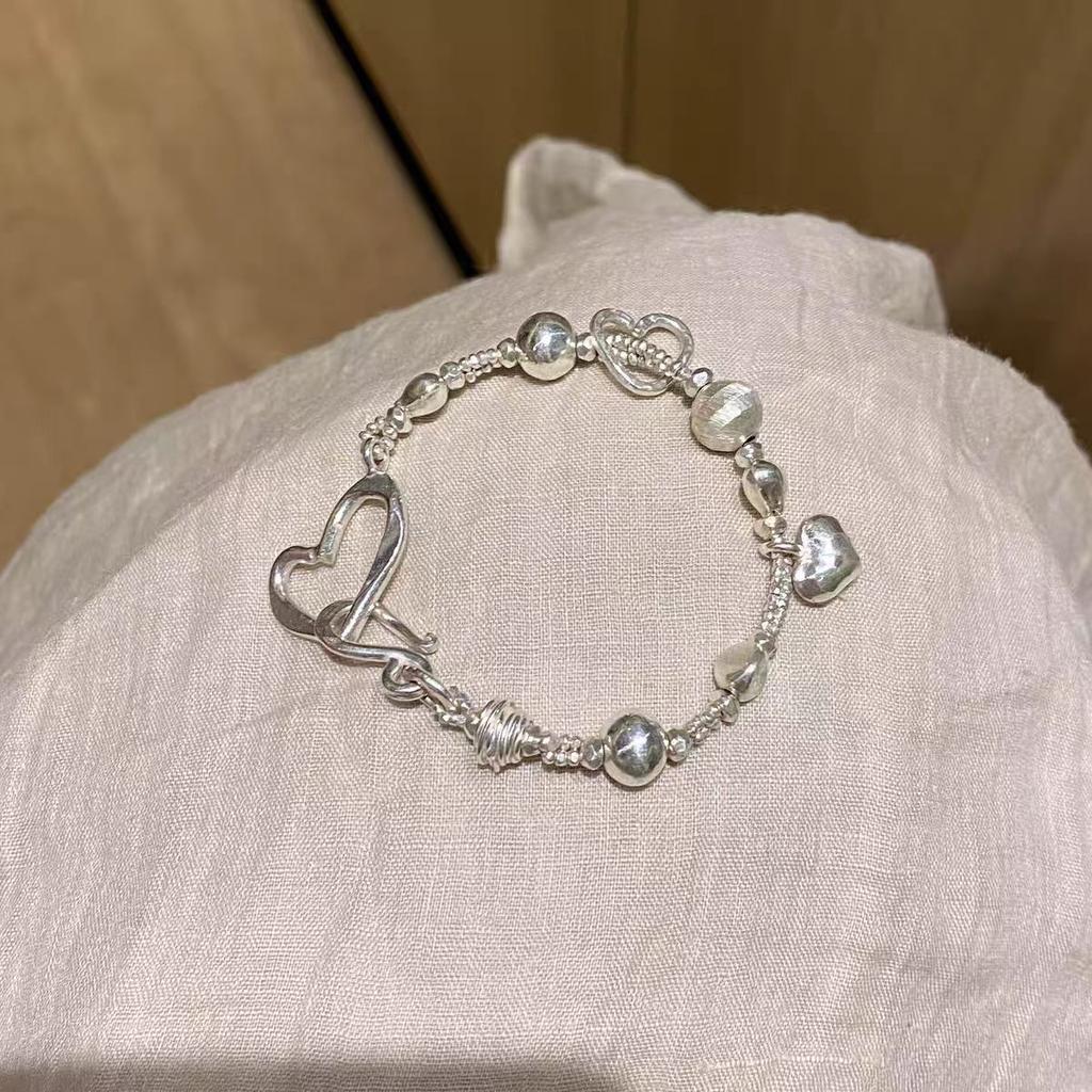 Silver irregular hollow love running ring splicing bracelet women's light luxury high-end niche retro Hong Kong style jewelry