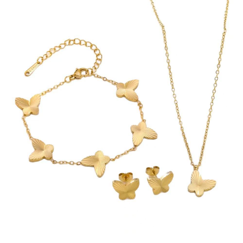 Gold Plated Titanium Steel Jewelry Set with Butterfly Carving: Necklace, Bracelet, and Earrings.