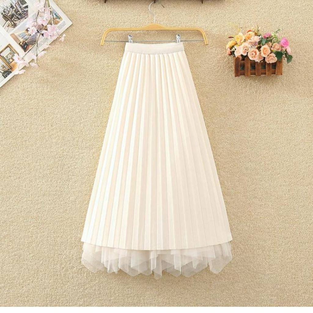 Modischer unregelmäßiger Netzrock mit hoher Taille und A-Linien-Design