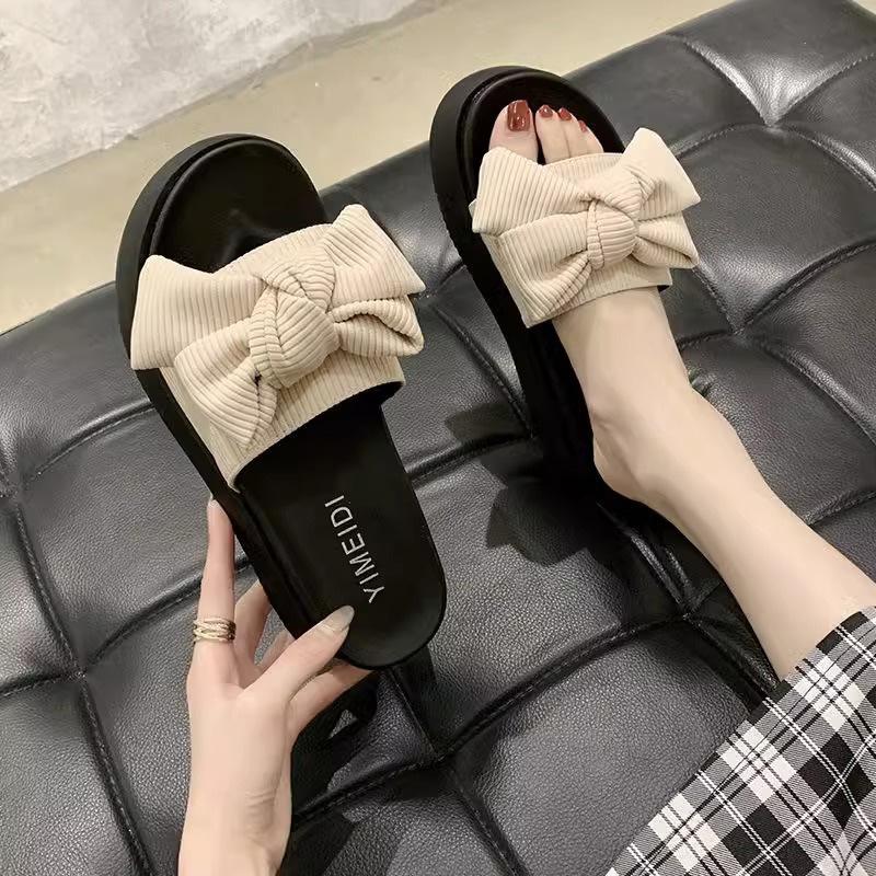 Black bow-tied one-word slippers for women's summer wear, new muffin thick-bottomed non-slip, advanced cool slippers