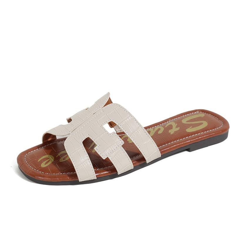 

Slippers women s outer wear 2025 new spring and summer fashion versatile flat bottom one-word beach travel sandals lizard pattern 34 абрикосовый