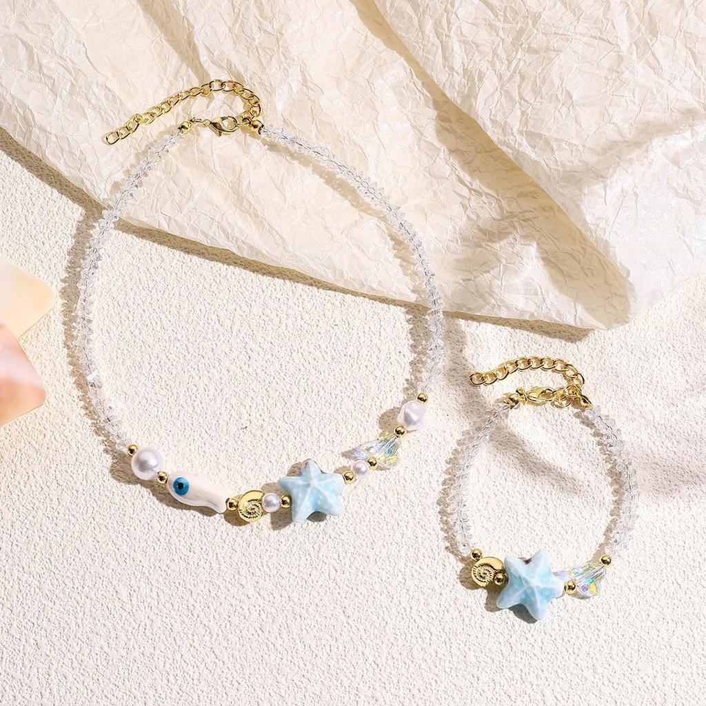 Seaside Elegance: Starfish & Shell Bead Bracelet with Oceanic Flair