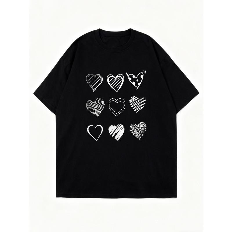 Schwarzes Oversized T-Shirt mit Herzmusterdruck für Freizeitkleidung und Alltagsstil