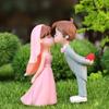 Charming Wedding Cake Topper Featuring Miniature Bride and Groom