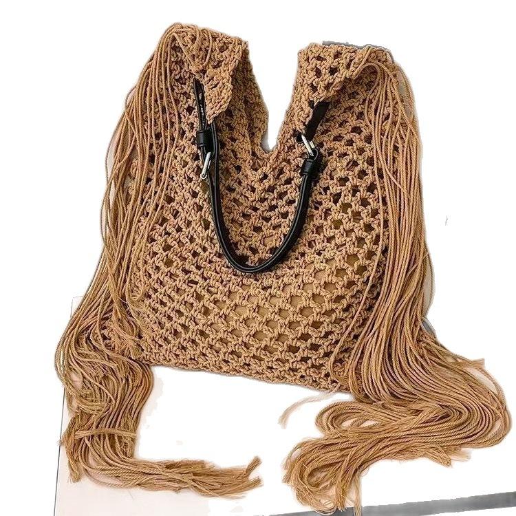 Women's Spring 2025 New Simple Hollow Woven Bohemian Tassels Tote Bag Casual Beach Vacation Style Single Shoulder Beach Bag